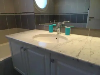 a bathroom counter with a sink and a mirror at Modern one bedroomed apartment just off the Cannes Seafront with a terrace and pool access 1753 in Cannes