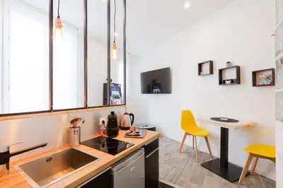 a kitchen with a sink and a counter top at Atelier & Galerie in Cannes