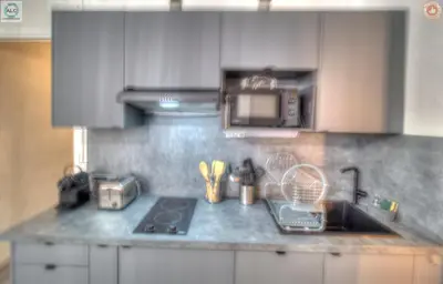a kitchen counter with a sink and a microwave at ALC - FF39 - 9 min Palais and Beaches in Cannes