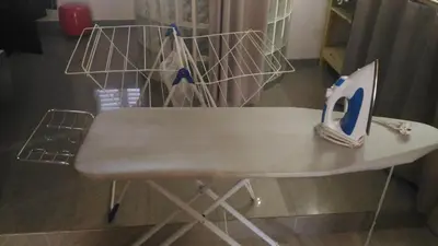 a table with a pair of scissors on top of it at Notre Dame in Cannes