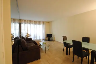 a living room with a couch and a table at Residence Gray d'Albion 2P ALI1165 in Cannes