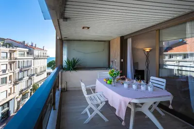 a table and chairs on a balcony with a view at Residence Gray d'Albion 2P BLA584 in Cannes