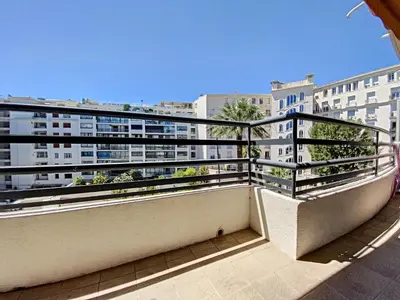 a balcony with a view of a building at Palais Rouaze 2P SOM2151 in Cannes