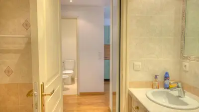 a bathroom with a sink and a toilet at 2 Pièces 57 Rue d'Antibes proche Palais in Cannes