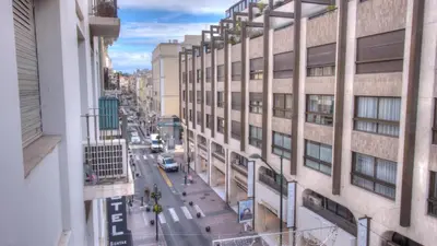 a view of a city street from a building at 2 Pièces 57 Rue d'Antibes proche Palais in Cannes
