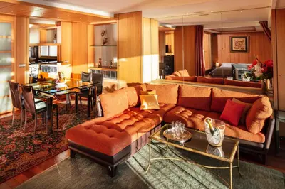 a living room with a couch and a table at Rabelais in Cannes