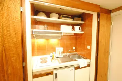 a small kitchen with a sink and a counter at Gray d'Albion studio BON500 in Cannes