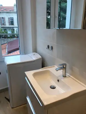 a bathroom with a sink and a window at Cannes center in Cannes