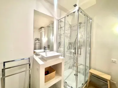 a bathroom with a sink and a shower at Pasteur by Welcome to Cannes in Cannes
