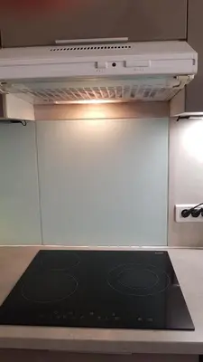 a black stove top oven in a kitchen at Forville in Cannes