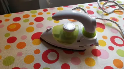 a electric hair dryer sitting on a polka dot table at Forville in Cannes