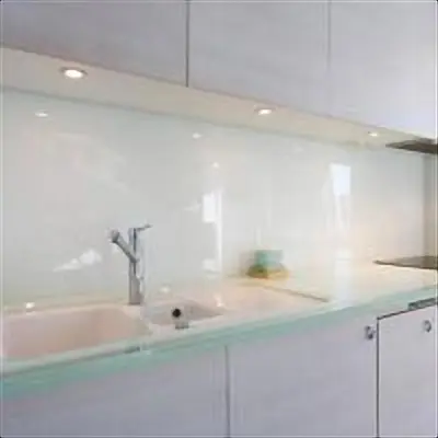 a white kitchen with a sink and a sink at Residence Saint Marc in Cannes