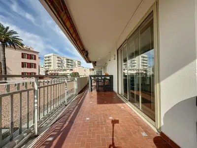a balcony with a view of a city at AGENCIA appartement 2 chambres au Suquet in Cannes