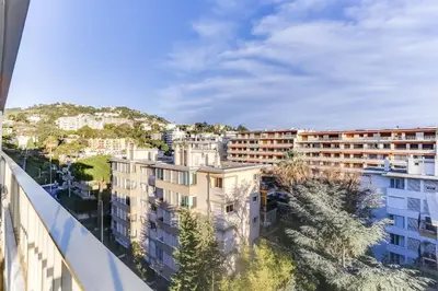 a view from the balcony of a building at IMMOGROOM - Renovated apartment - Terrace - AC - Wifi in Cannes