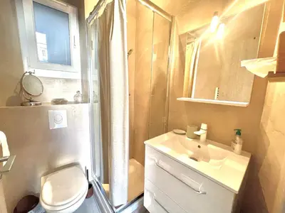 a bathroom with a toilet and a sink and a shower at Casa Valfa à 200m du Palais, by Welcome to Cannes in Cannes