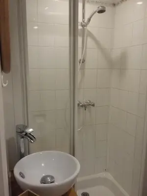 a bathroom with a shower and a sink at Studio à 2 pas du Palais in Cannes