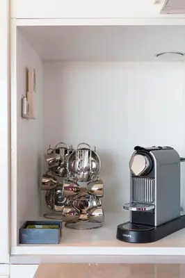 a shelf with a bunch of kitchen utensils at Cannes Vieux Port in Cannes