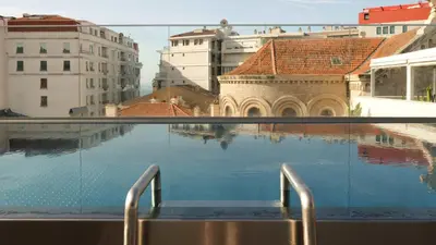 a view of a pool of water with buildings at Five Seas by Inwood Hotels in Cannes