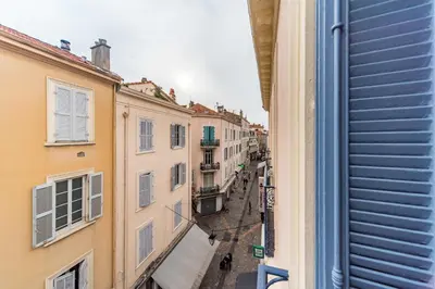 a view from a window of an alley between buildings at IMMOGROOM- Close to the Palais des festivals- Wifi in Cannes