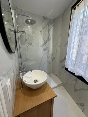 a bathroom with a sink and a shower at Mark in Cannes