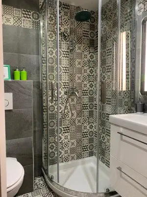 a bathroom with a shower and a toilet at Azur Studios Cannes in Cannes