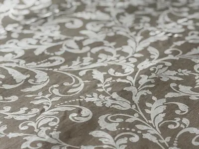a black and white comforter with white flowers on it at Studio Cosy Pradignac in Cannes
