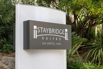 a sign that reads staybridge suitesun hotel like at Staybridge Suites - Cannes Centre by IHG in Cannes