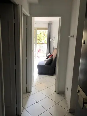 a hallway with a couch in a living room at Cannes center in Cannes