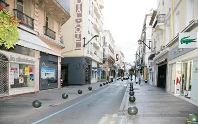 an empty street in a city with buildings at RIVIERA STUDIO CANNES CENTER in Cannes
