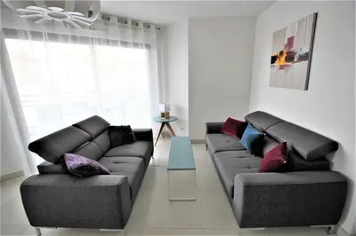 a living room with a couch and two couches at VENDÔME APARTMENT in Cannes
