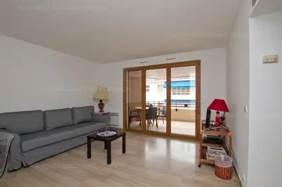 a living room with a couch and a table at Alessandra in Cannes