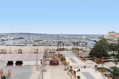 a view of a harbor with a marina with boats at Carrousel 5 in Cannes