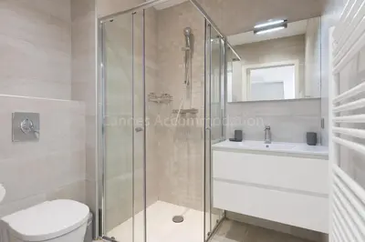 a bathroom with a shower and a toilet and a sink at Sparkle in Cannes