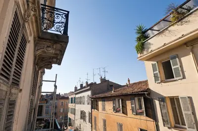 a view of an alley between two buildings at Festival Apartment in Cannes