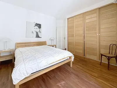 a bedroom with a bed and a desk and a chair at Luxury 1 bedroom Quai St Pierre 2 mins from the Palais & Croisette 269 in Cannes