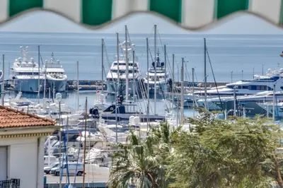 a group of boats docked in a harbor at IMMOGROOM - Sea View - Balcony - 5 min from the beach - AC - Wifi in Cannes
