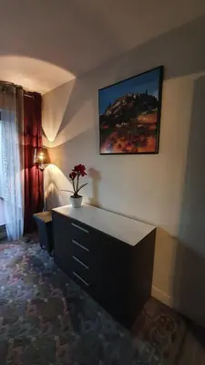 a bathroom with two sinks and a large mirror at Sea view Penthouse with terrace in Cannes