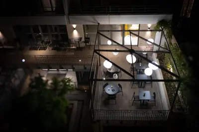 an overhead view of a building with tables and chairs at Nemea Appart Hotel Cannes Palais in Cannes