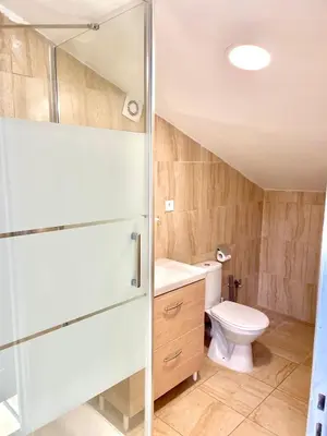 a bathroom with a shower and a toilet at Safari apartment in heart of Cannes and beaches in Cannes