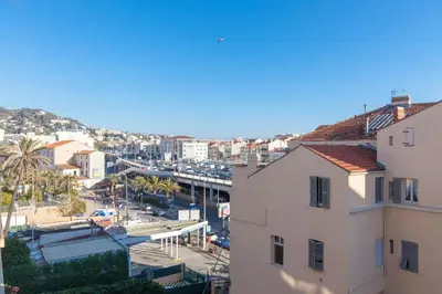a view of a city with buildings and a street at Cocooning 3 pièces duplex 3 étoiles calme centre ville à 5mn plages et Palais in Cannes