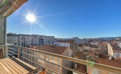 a view of the city from the balcony of a building at Agence des Résidences - Appartements privés du 45 CROISETTE - Standard in Cannes