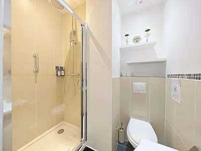 a bathroom with a shower and a toilet at Croisette carre d'or in Cannes