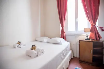 a bathroom with a sink and a tub and a mirror at Bohemian Apartment by Connexion in Cannes
