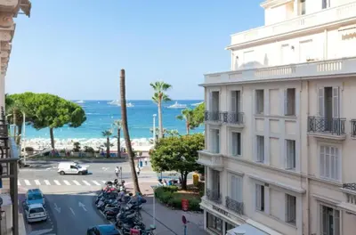 a view of the ocean from a building at PALAIS MIRAMAR CROISETTE APART 1 MIN CARLTON in Cannes