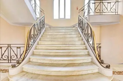 a set of stairs in a building at PALAIS MIRAMAR CROISETTE APART 1 MIN CARLTON in Cannes