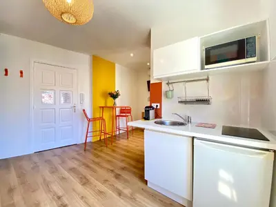 a kitchen with a sink and a counter top at Studio Luxury Toîts du Soleil By SCLS Locations in Cannes
