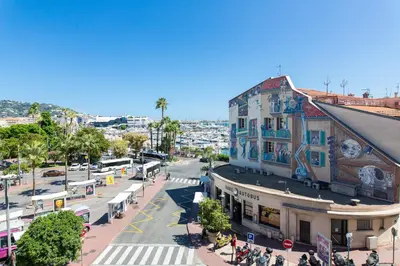 an overhead view of a city street with a building at Maracuja YourHostHelper in Cannes