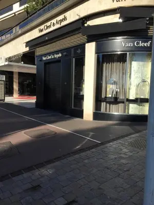 a store front of a building with a sign on it at Appartement Belle Azur in Cannes