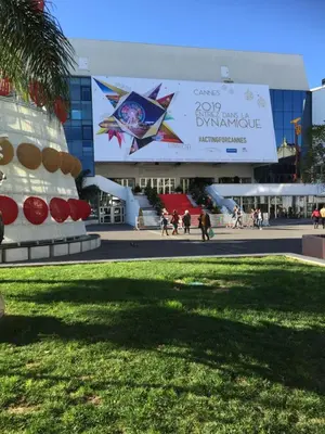 a large building with a large sign in front of it at Appartement Belle Azur in Cannes