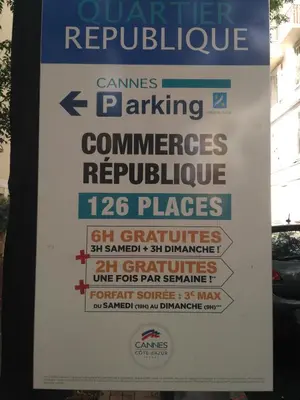 a sign that is on the side of a building at Le Marignan in Cannes